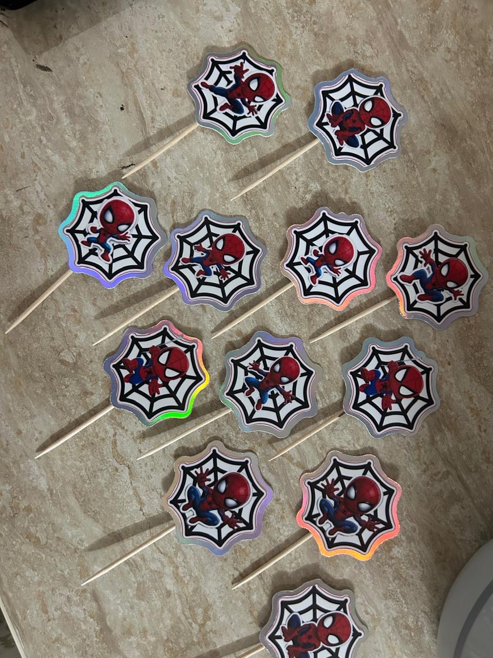 Freshly cut Spider-Man cupcake toppers