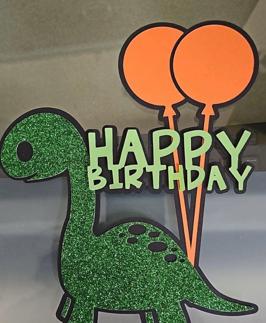Green glitter dinosaur happy birthday topper with balloons