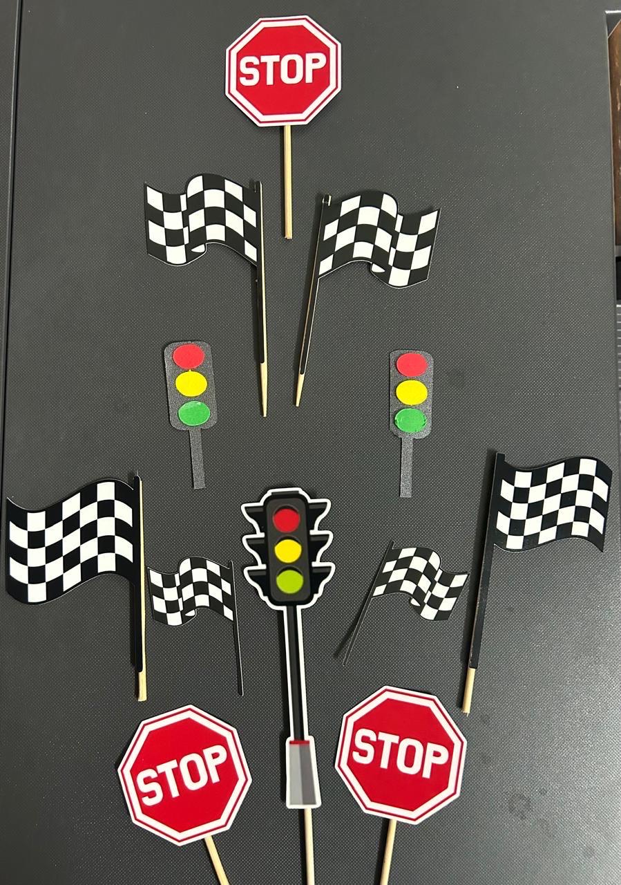 Racing themed cupcake toppers with stop signs, flags and traffic lights