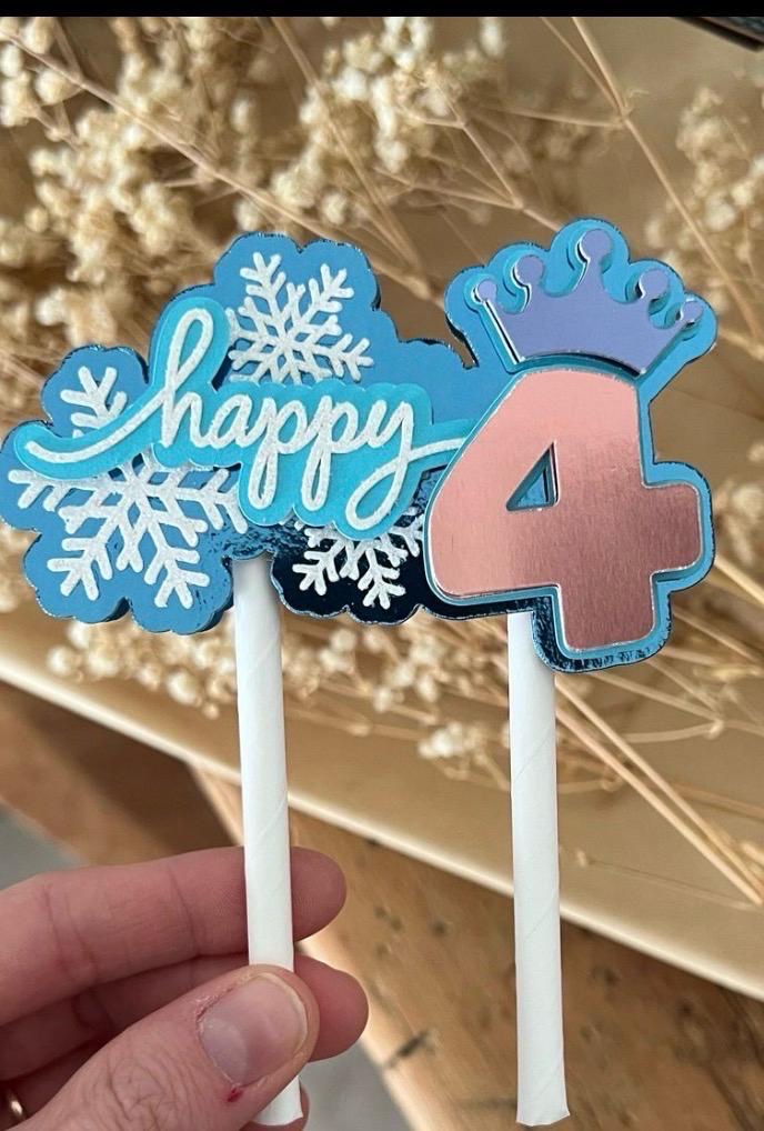 Snowflake themed happy fourth birthday topper in rose gold and blue