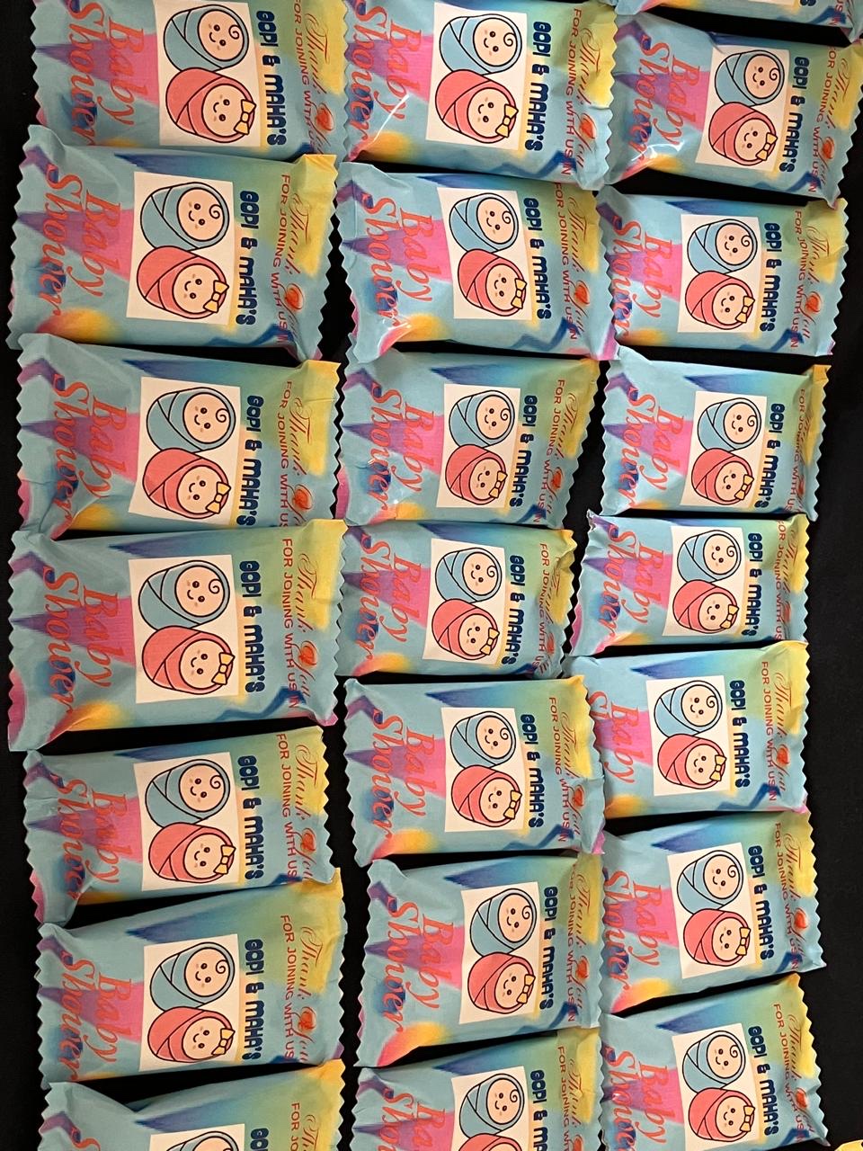 Pastel baby themed chocolate wraps for a naming ceremony